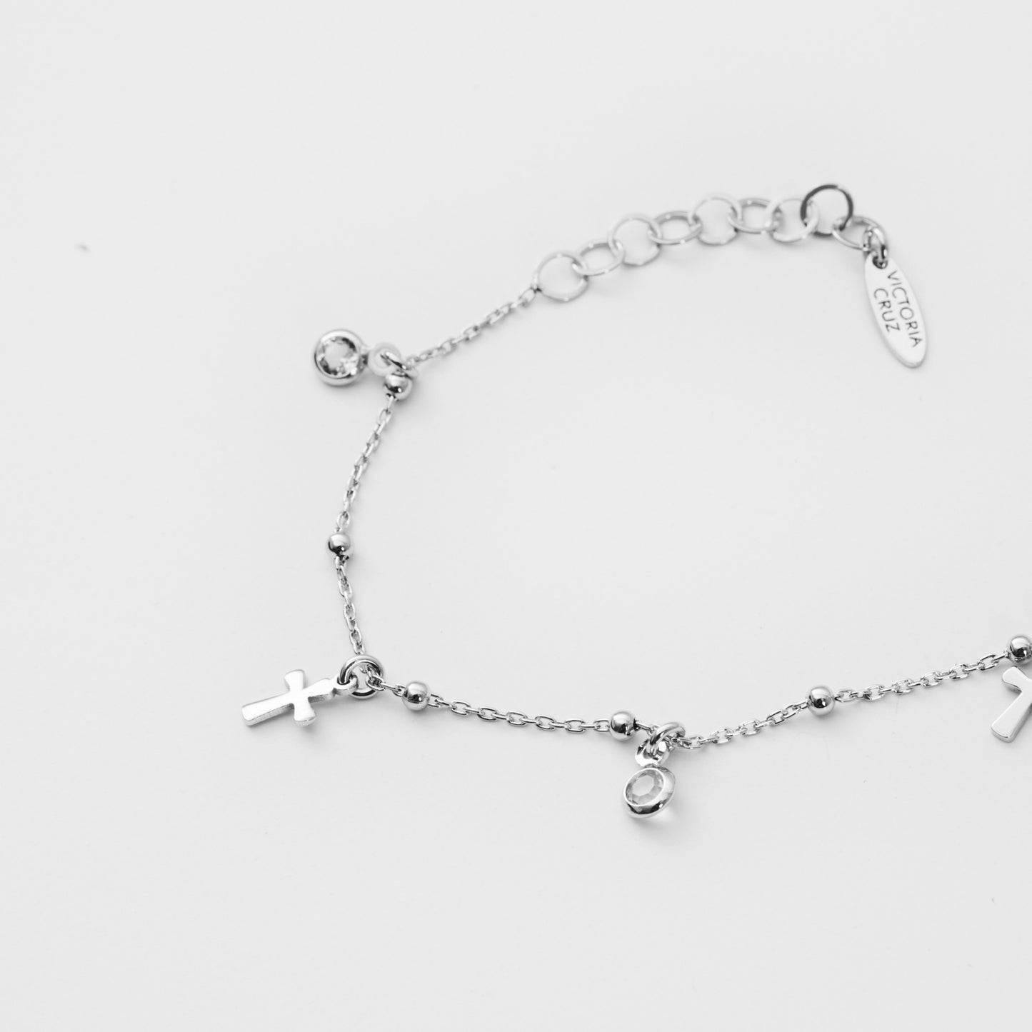 Pulsera cruz cristal blanco en Plata baño rodio de Alea