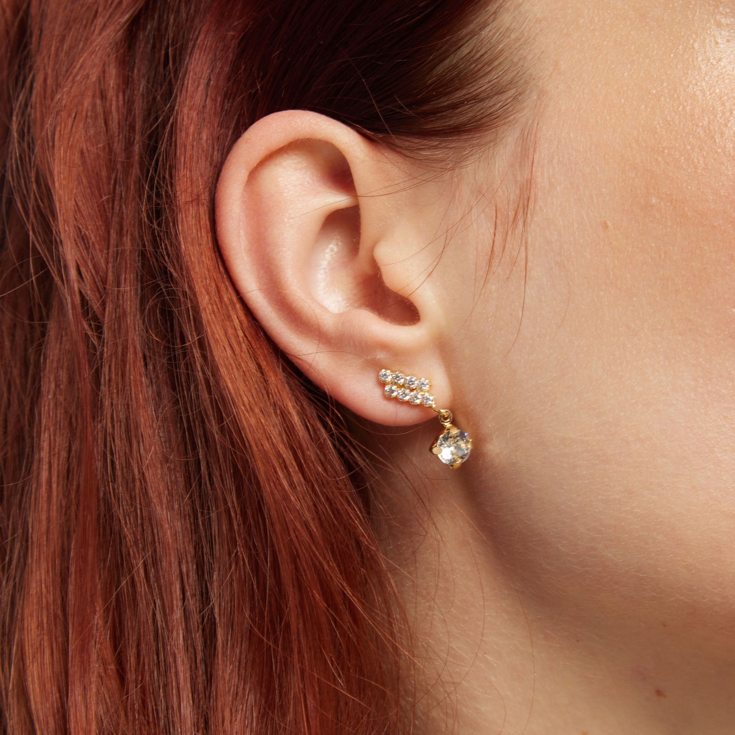 Short climber cascade earrings with white crystal in silver from Aurore